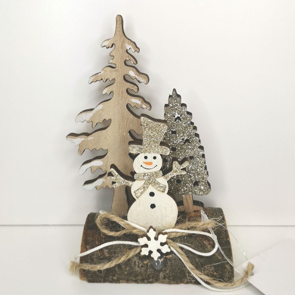 Decorazione natalizia su tronco con glitter